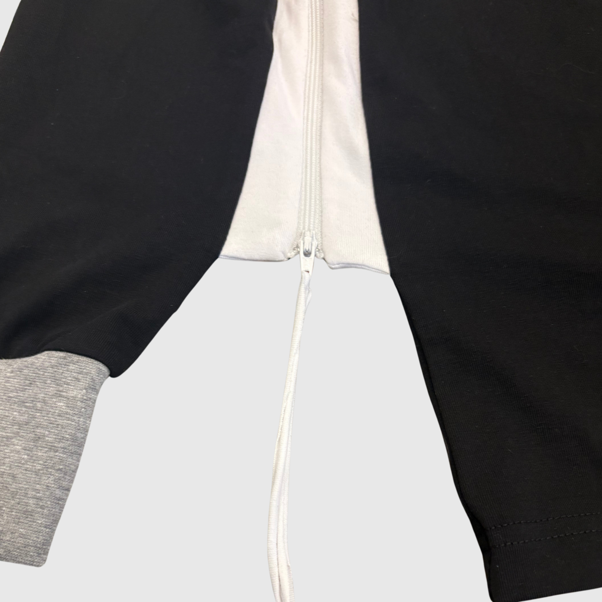 Sleep Shirt with Arm Control — sleeve zipper closed from armpit to cuff